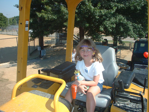 Alsatia sits in a Bulldozer.jpg 107.9K